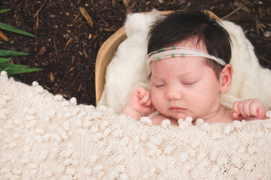 Delicate baby girl outdoor pictures Sleeping in a bowl