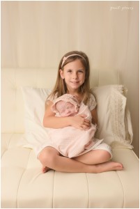 Older Sibling with Baby Sister