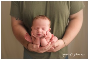 Newborn Baby in daddys hands greer SC