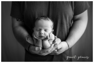 Newborn Baby in Daddys hands Greenville SC